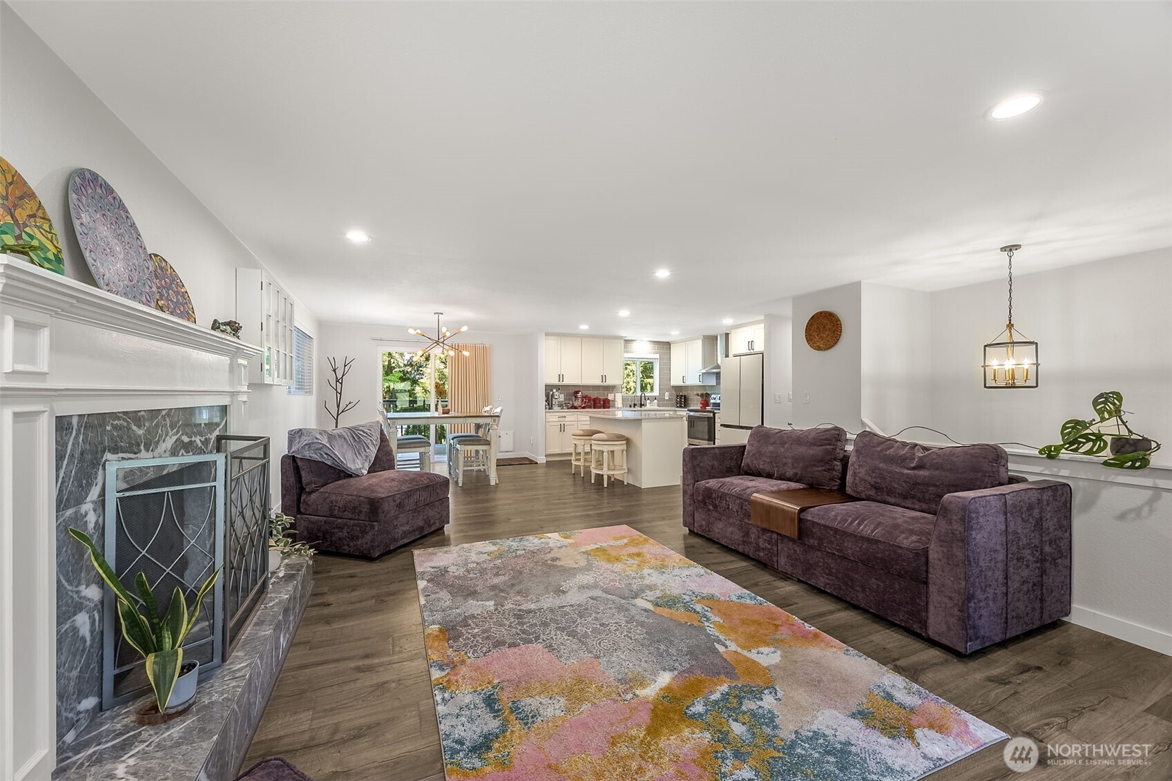 24028 6th Place West Bothell, WA 98021 - Photo 7 of 35 a living room with furniture and a fireplace