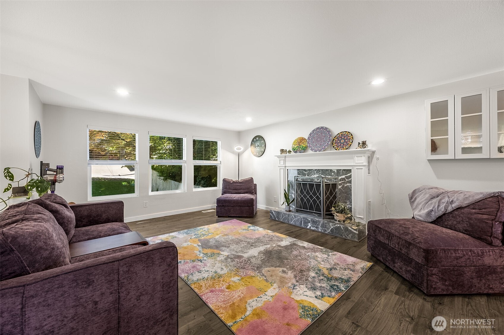 24028 6th Place West Bothell, WA 98021 - Photo 8 of 35 a living room with furniture and a fireplace