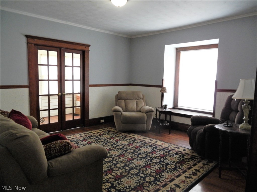 355 South 9th Street Coshocton, OH 43812 - Photo 9 of 35 living room, sunroom out the french doors