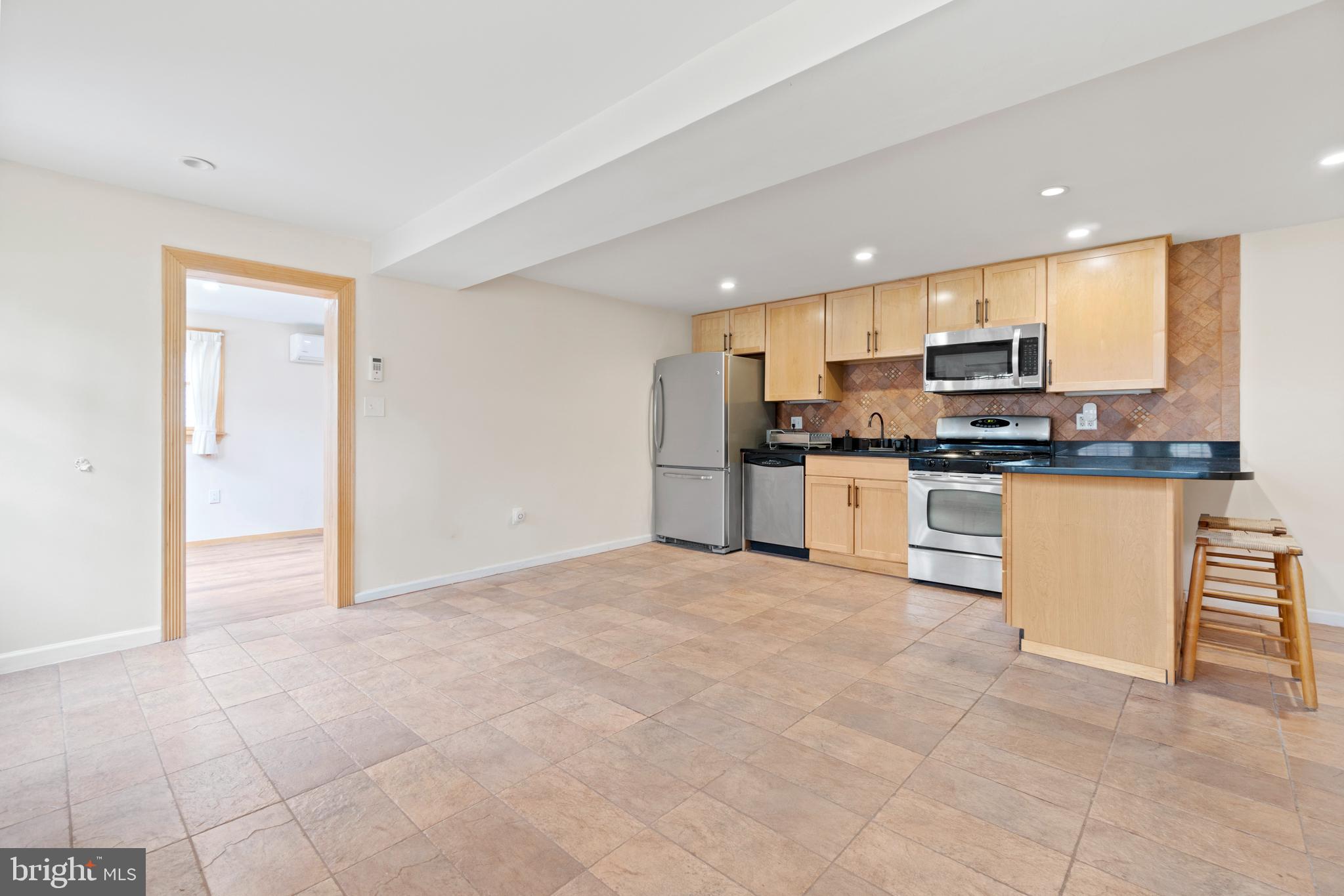 441 21st Street Northeast, Unit B Washington, DC 20002 - Photo 20 of 23 Kitchen/Dining/Living Area