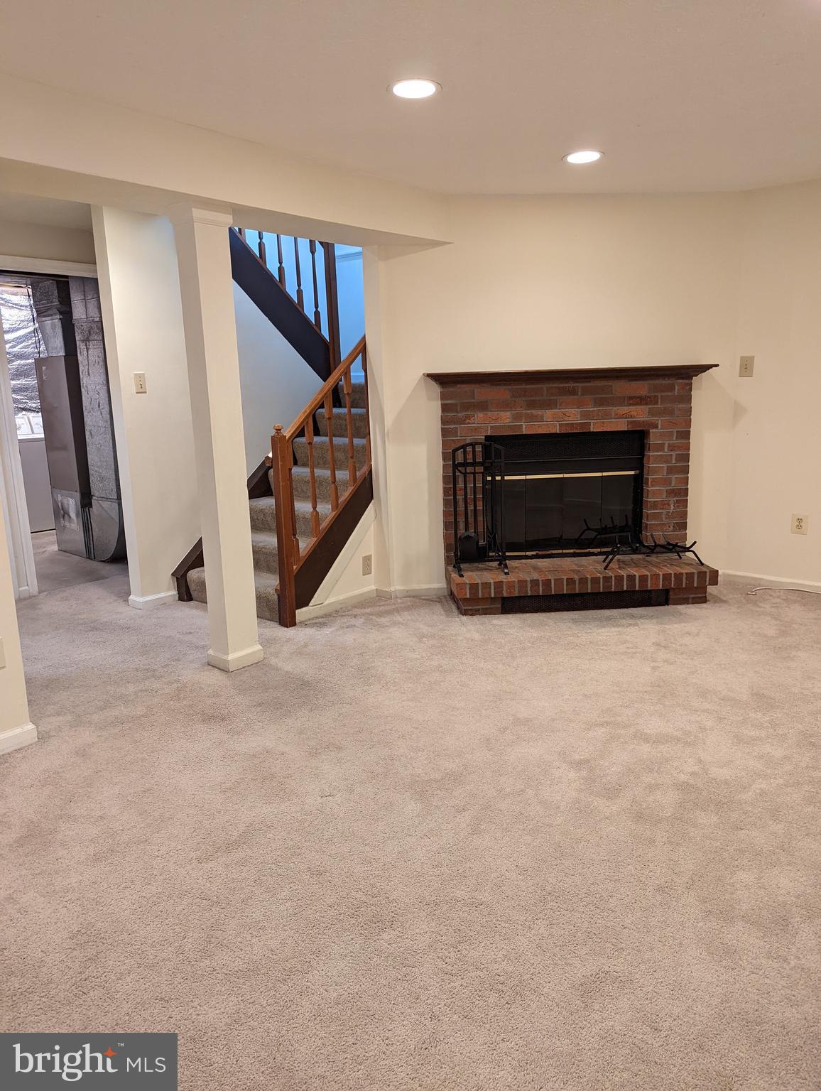 42 Shelldrake Court Damascus, MD 20872 - Photo 24 of 35 lower-level wood burning fireplace