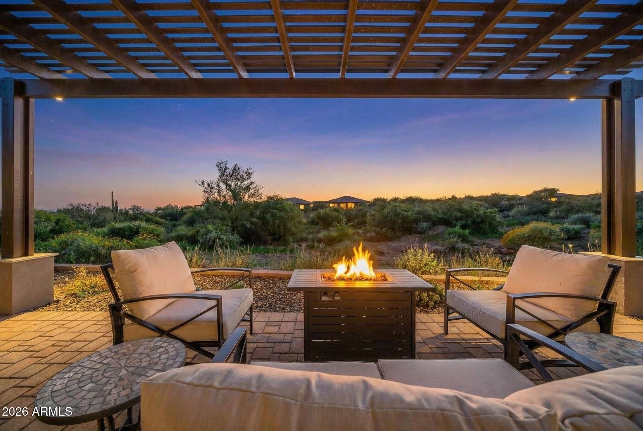 a view of a lake with outdoor seating