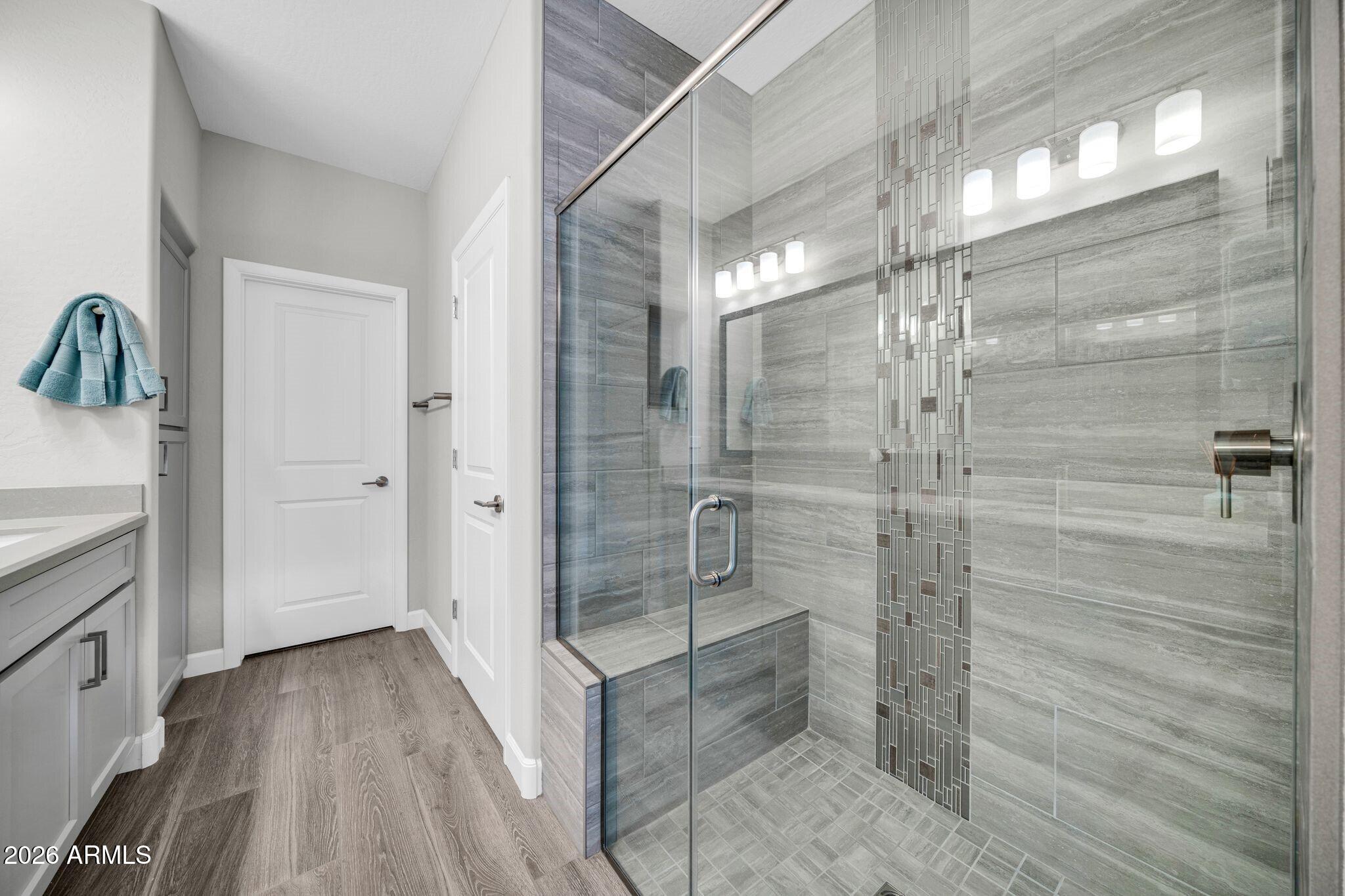 17501 East Cindercone Road Rio Verde, AZ 85263 - Photo 14 of 43 a bathroom with a shower and a sink