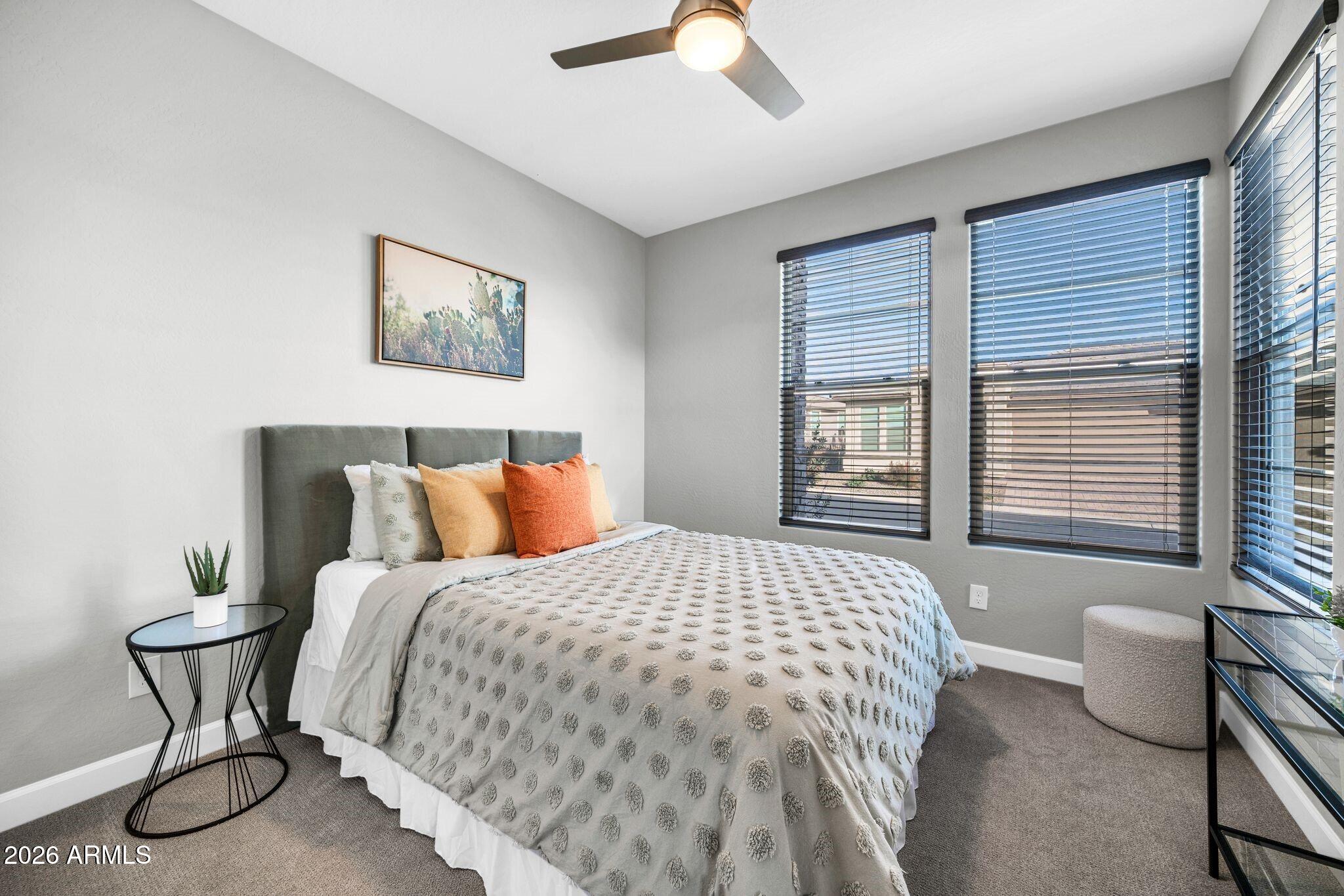 17501 East Cindercone Road Rio Verde, AZ 85263 - Photo 15 of 43 a bedroom with a bed and chair