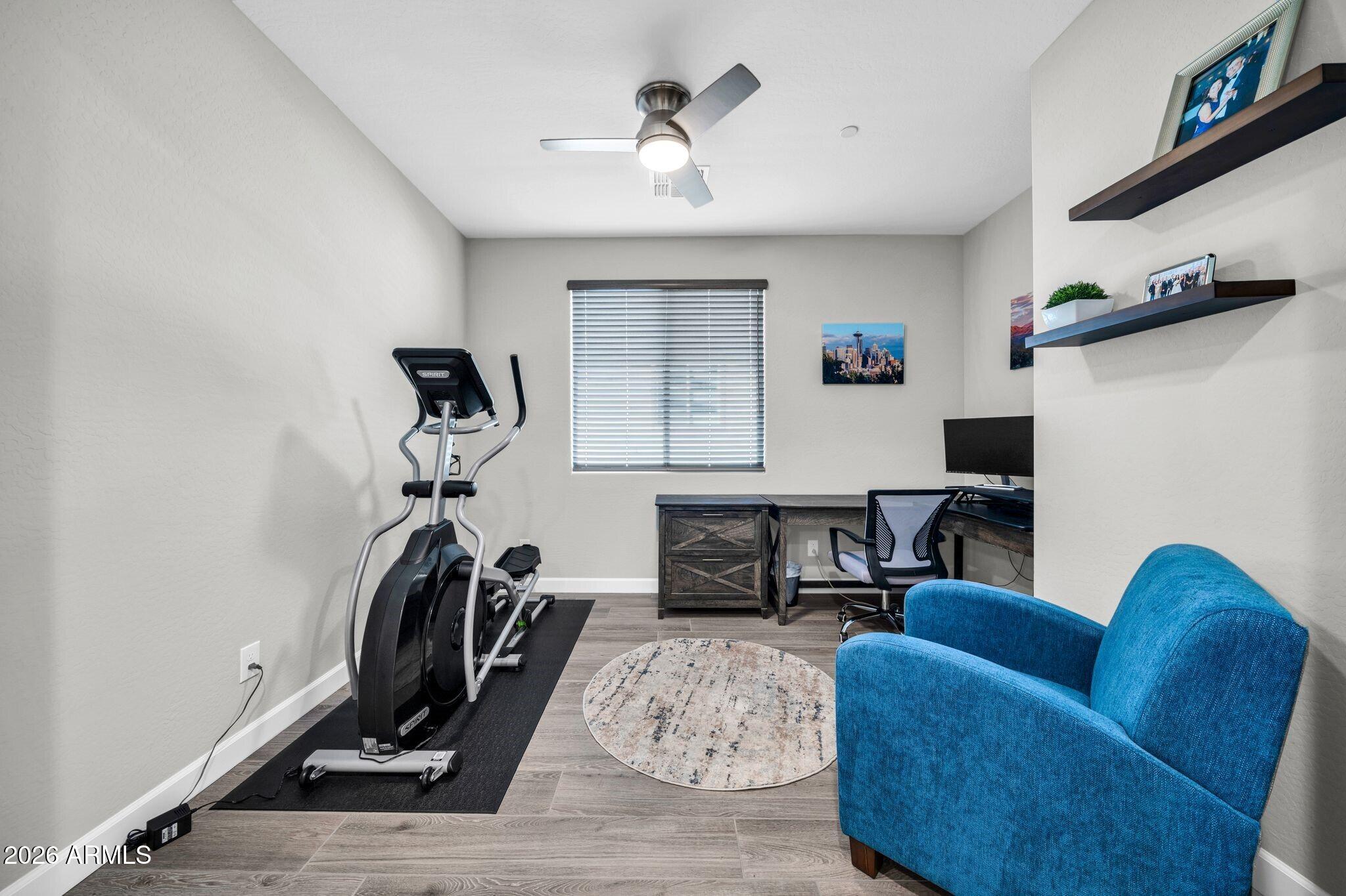17501 East Cindercone Road Rio Verde, AZ 85263 - Photo 17 of 43 a view of a livingroom with furniture and a ceiling fan