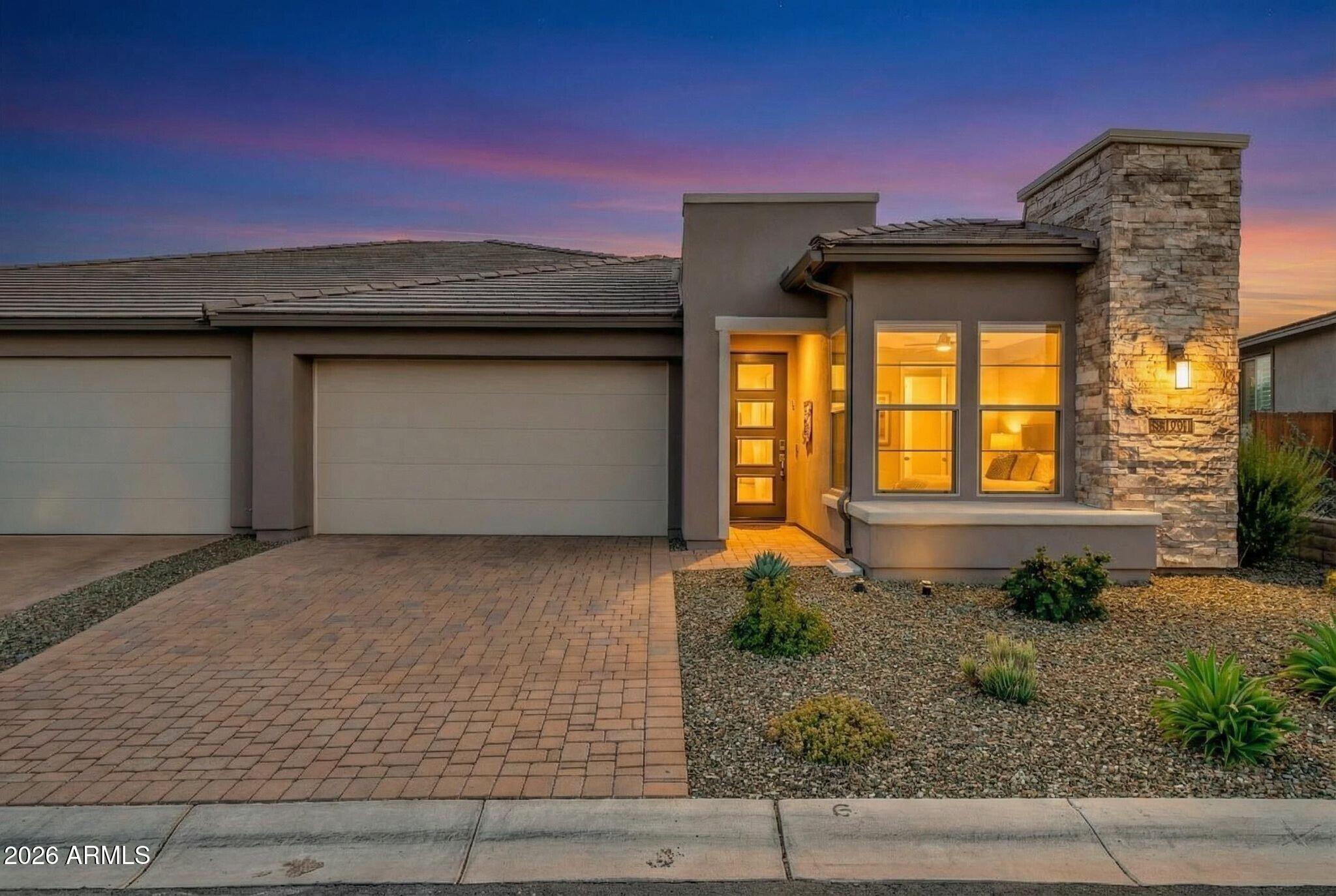 17501 East Cindercone Road Rio Verde, AZ 85263 - Photo 3 of 43 a front view of a house