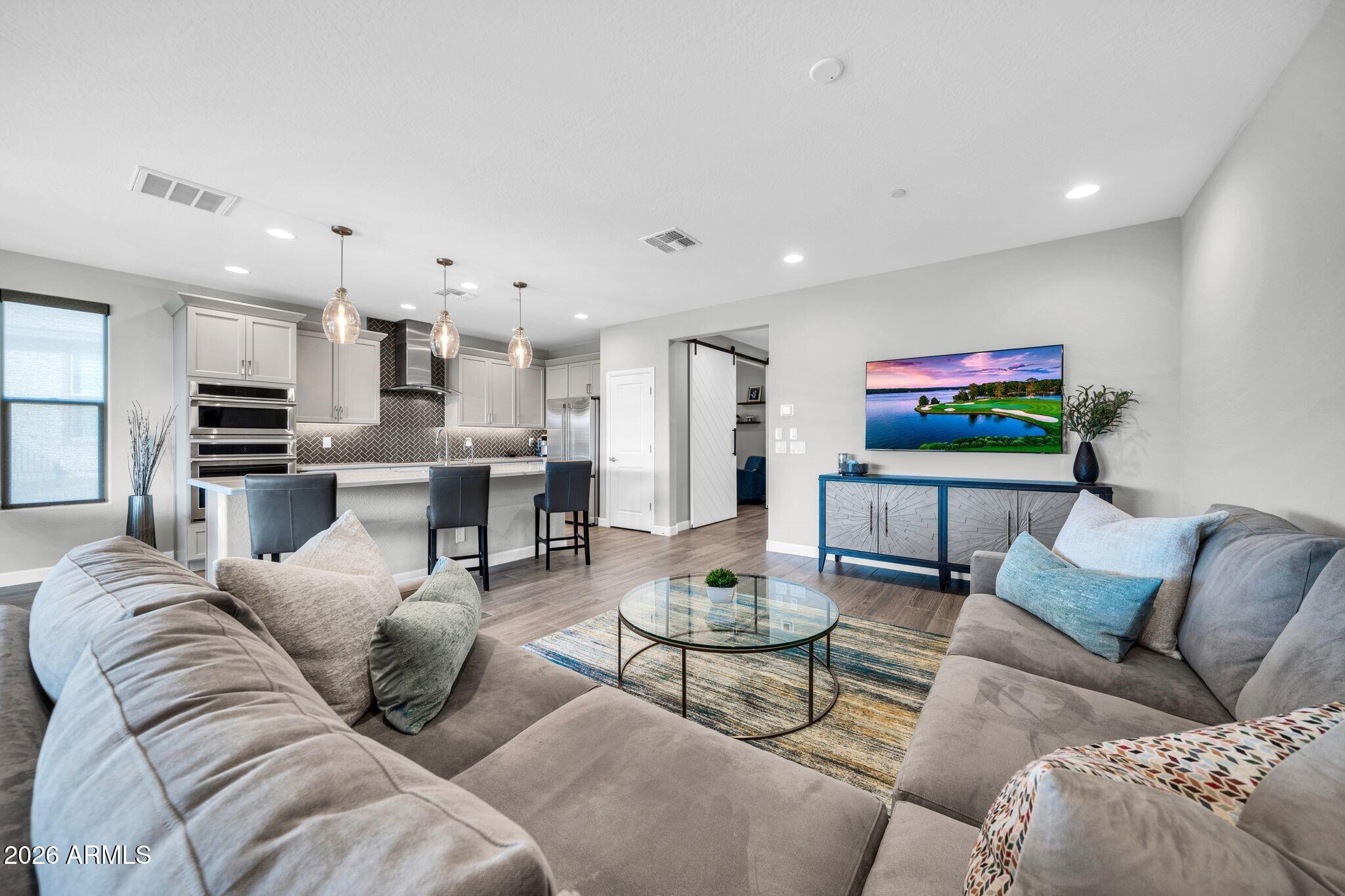 17501 East Cindercone Road Rio Verde, AZ 85263 - Photo 10 of 43 a living room with furniture kitchen view and a kitchen
