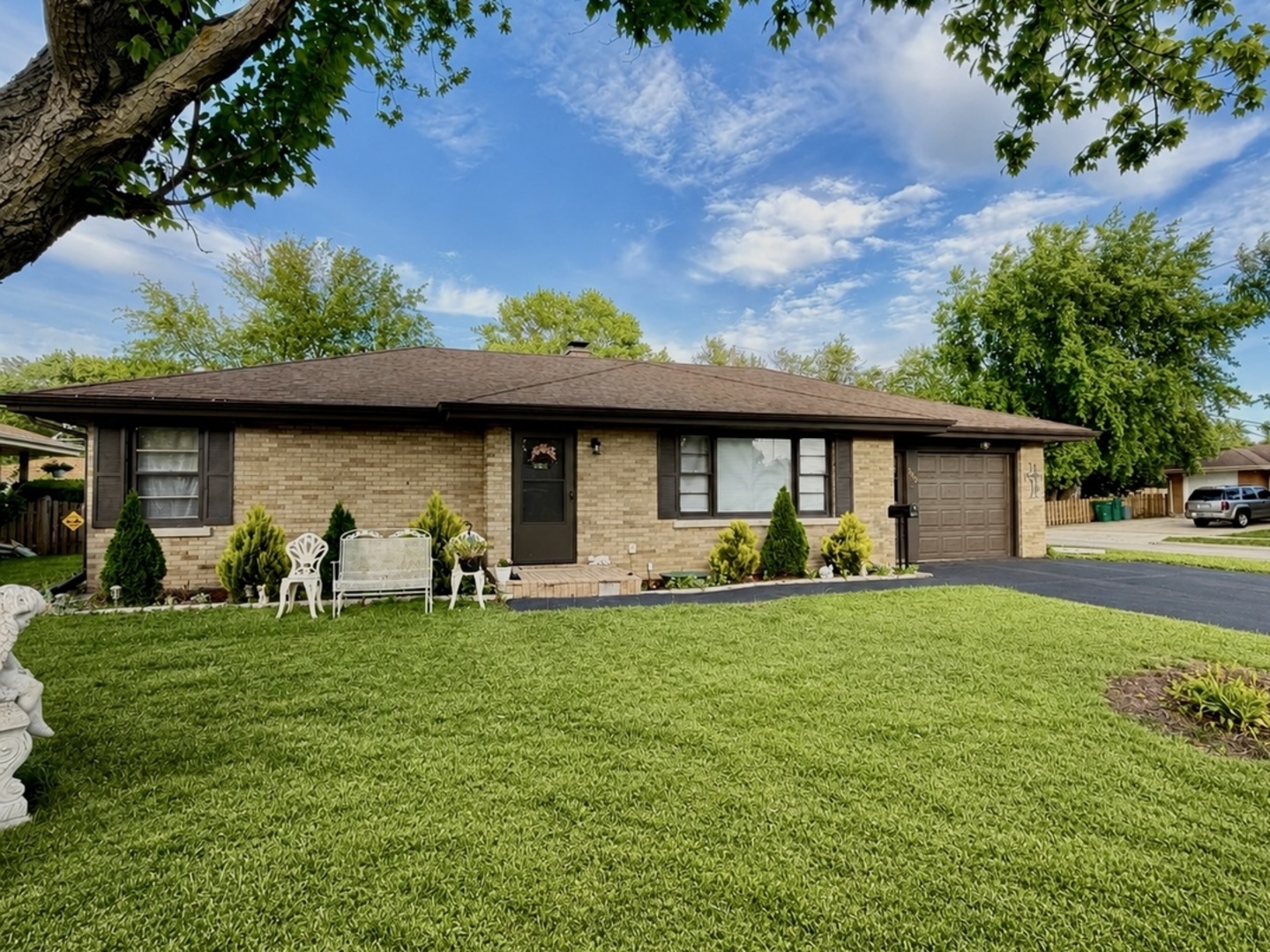 900 Westminster Road Joliet, IL 60435 - Photo 2 of 16 a view of a house with a yard