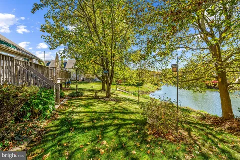 a view of a lake with a yard
