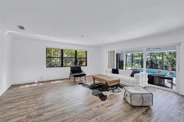 a bedroom with a bed and a table