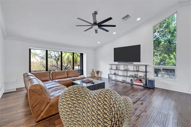 a view of a balcony with wooden floor