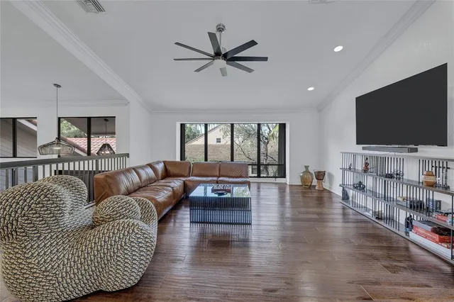 a view of a balcony with wooden floor