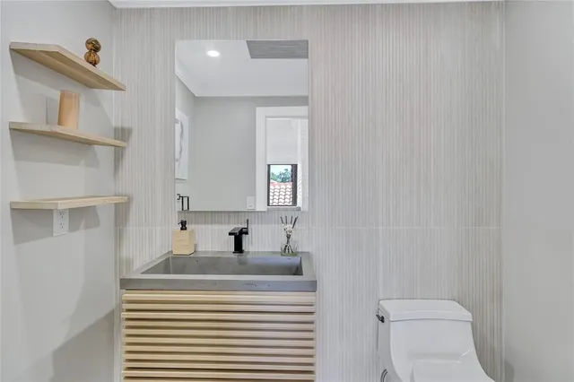 a view of a backyard with sitting area