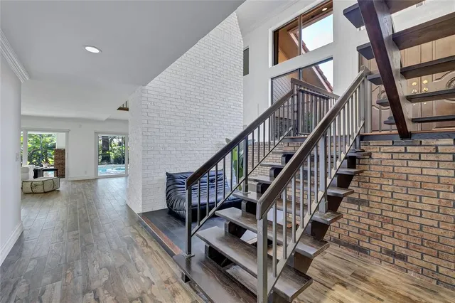 an aerial view of house with yard