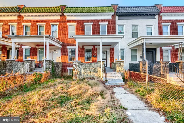 front view of a building with a yard