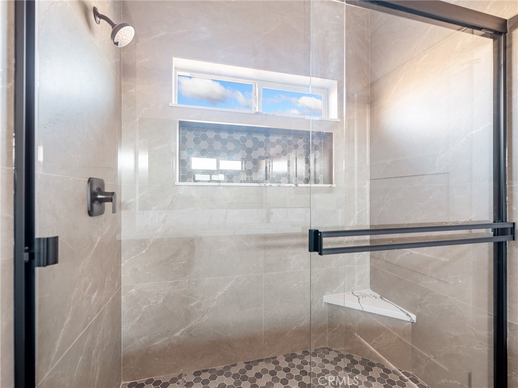 16173 Pela Road Apple Valley, CA 92307 - Photo 22 of 36 a bathroom with a shower