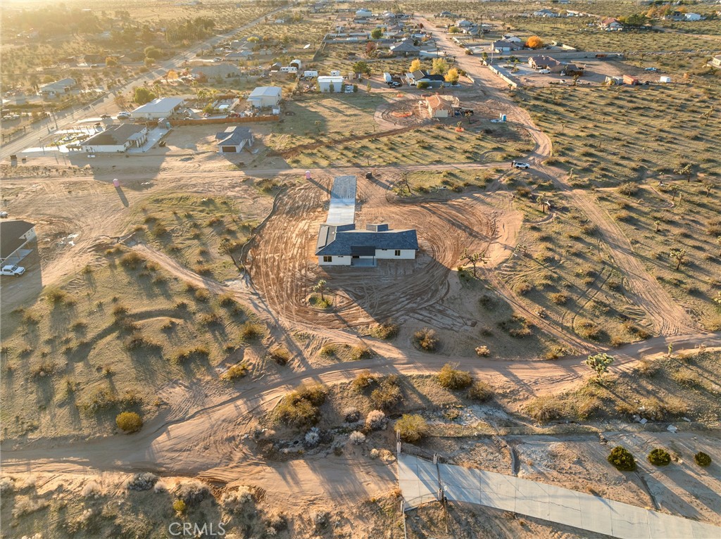 16173 Pela Road Apple Valley, CA 92307 - Photo 28 of 36 an aerial view of residential houses with yard