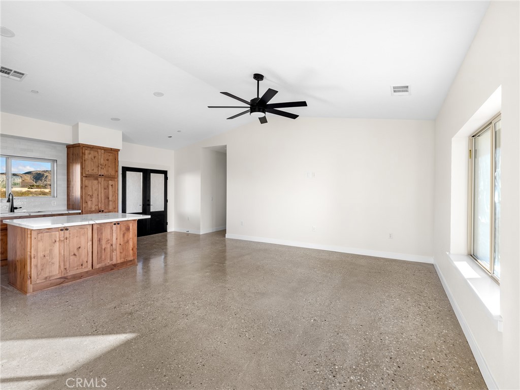 16173 Pela Road Apple Valley, CA 92307 - Photo 3 of 36 a view of an empty room with a window