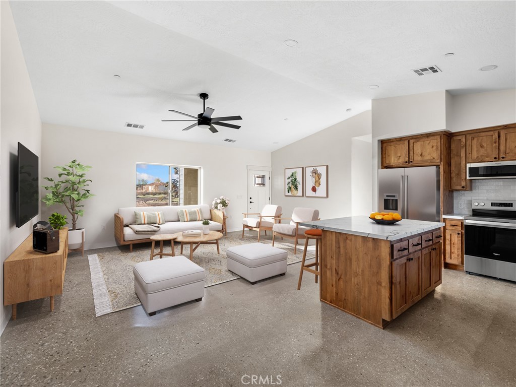 16173 Pela Road Apple Valley, CA 92307 - Photo 7 of 36 a living room with furniture and a window