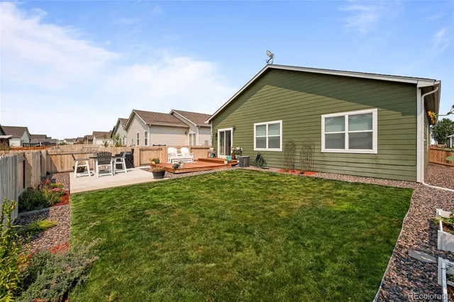 a house view with a garden space