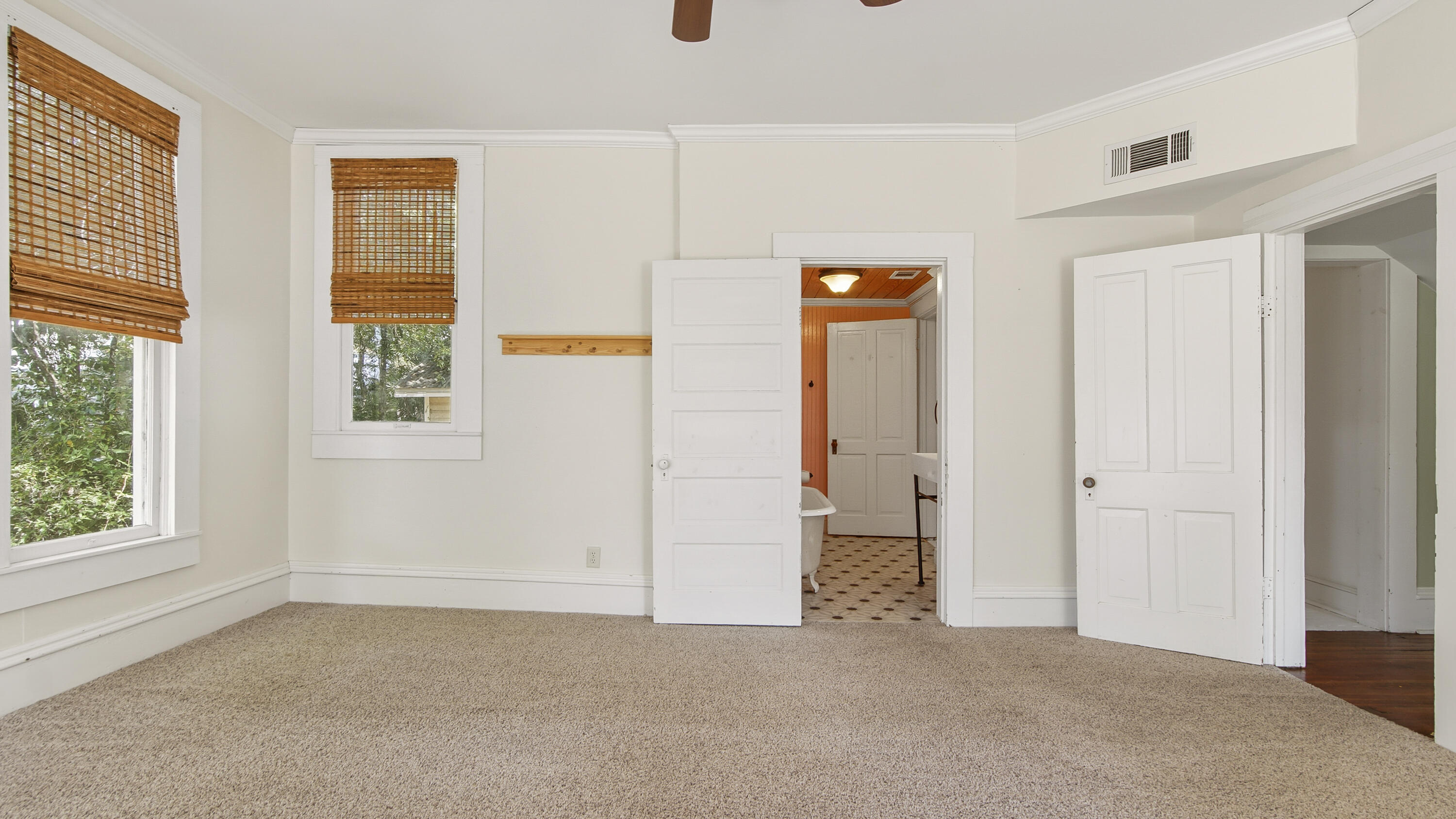 87 Bay Avenue DeFuniak Springs, FL 32435 - Photo 15 of 55 an empty room with windows
