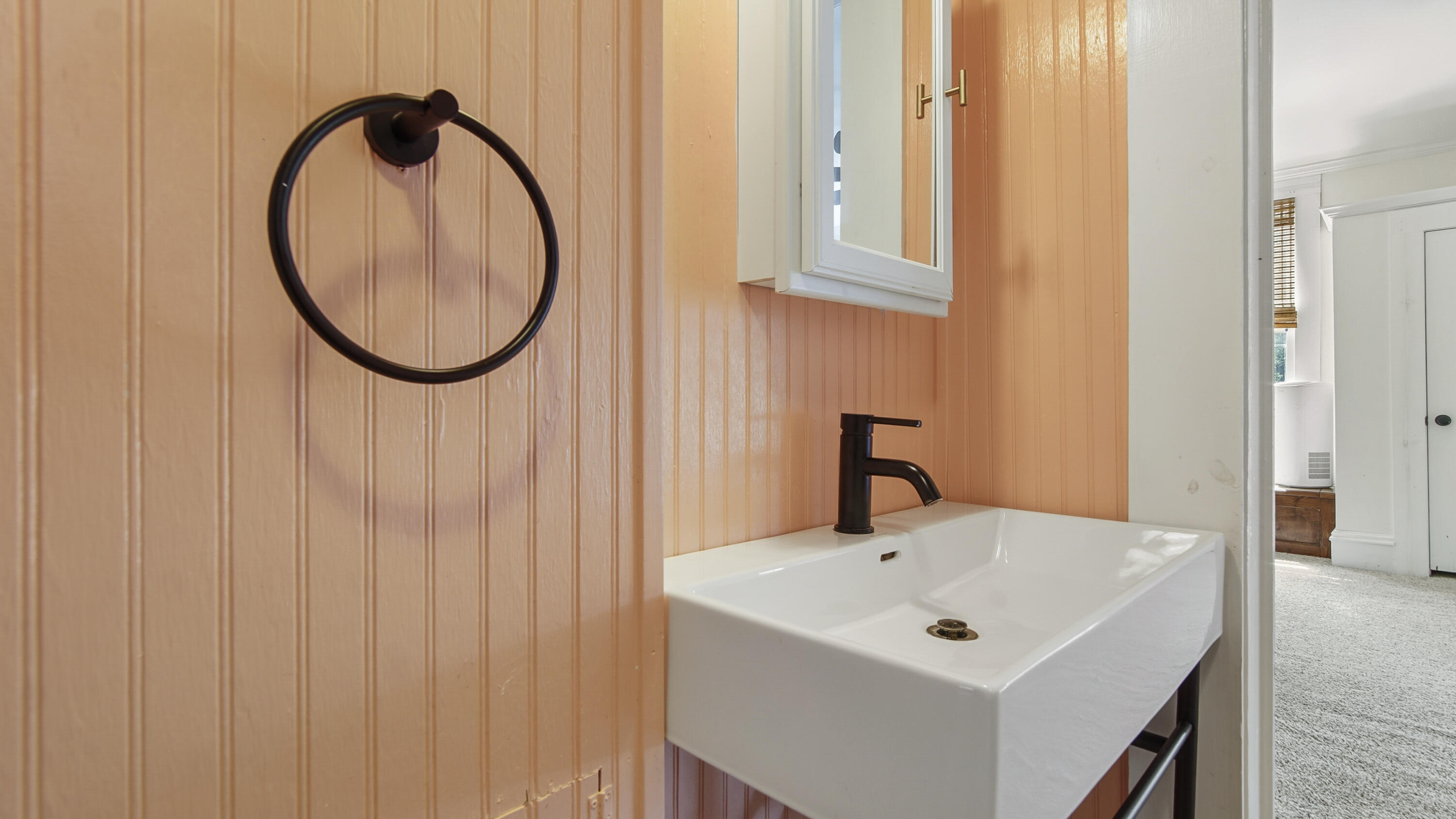 87 Bay Avenue DeFuniak Springs, FL 32435 - Photo 18 of 55 a bathroom with a sink and a mirror