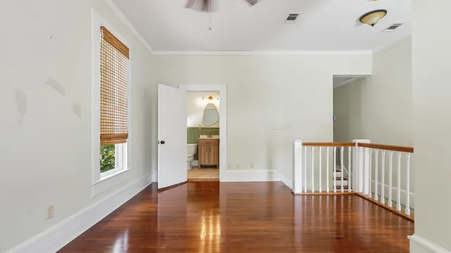 a view of an entryway with wooden floor