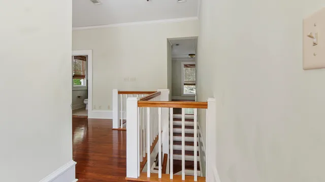 a view of entryway with wooden floor