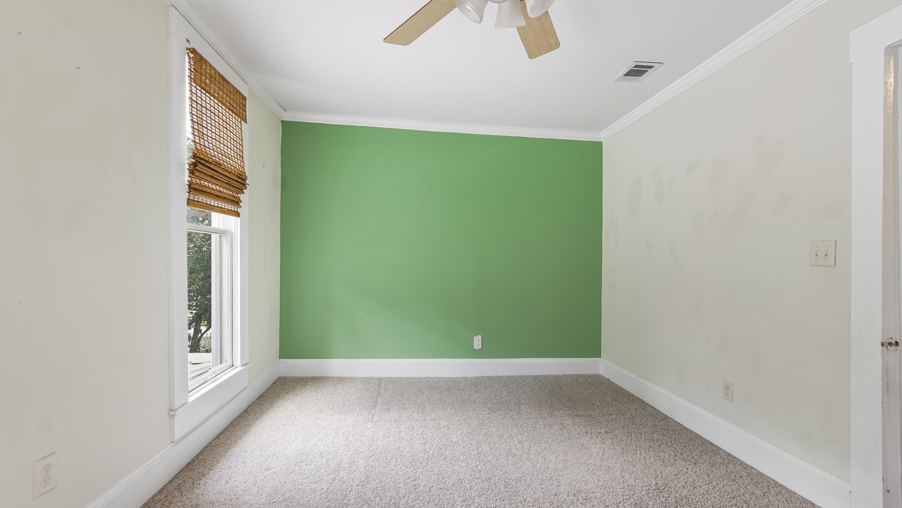 87 Bay Avenue DeFuniak Springs, FL 32435 - Photo 37 of 55 an empty room with closet and windows