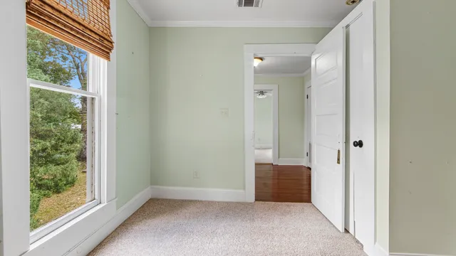 a view of an empty room and window