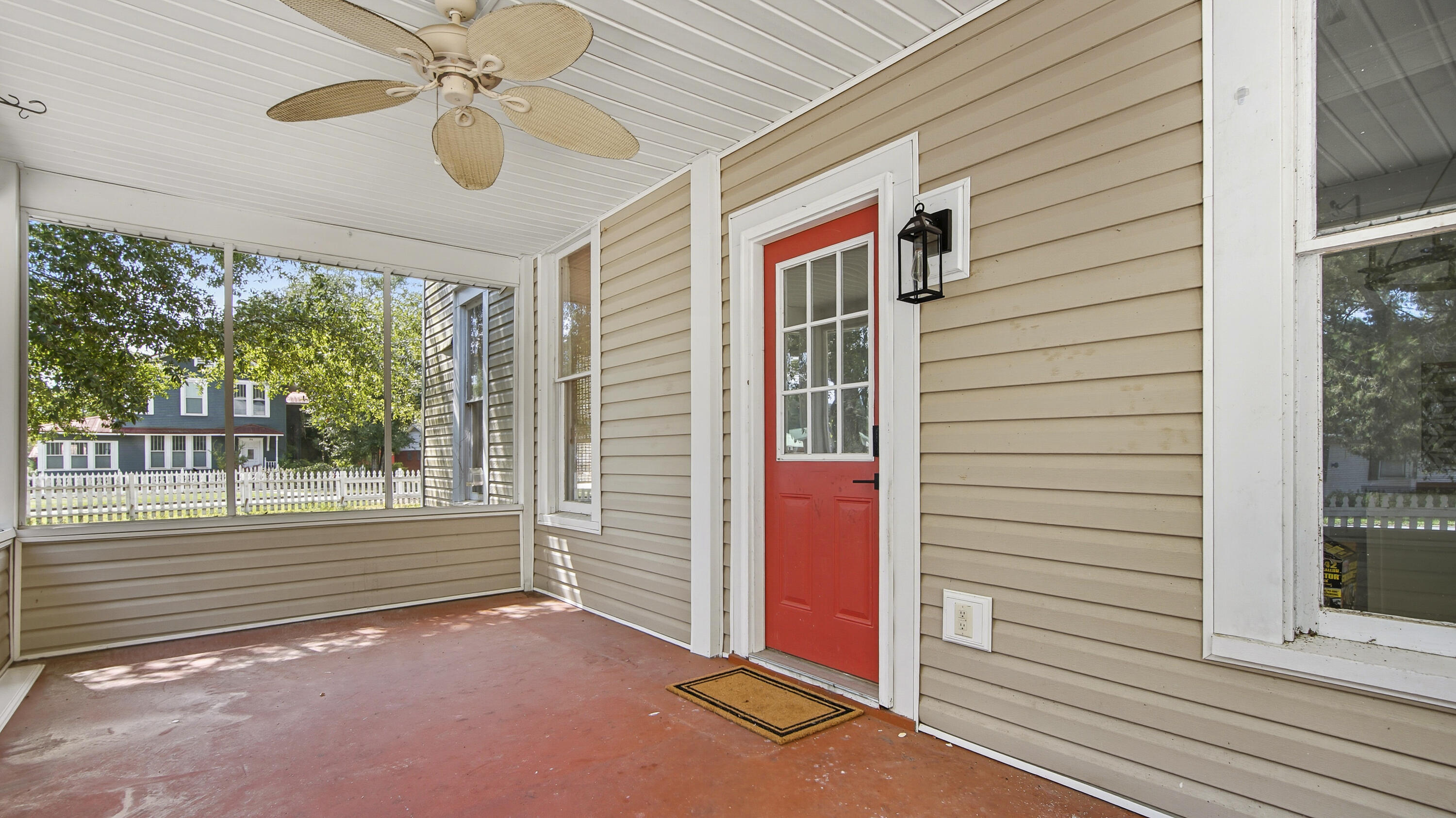 87 Bay Avenue DeFuniak Springs, FL 32435 - Photo 41 of 55 a view of a porch with a door and wooden floor