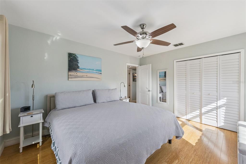 124 East Harding Street Orlando, FL 32806 - Photo 12 of 21 a bedroom with a large bed and a window