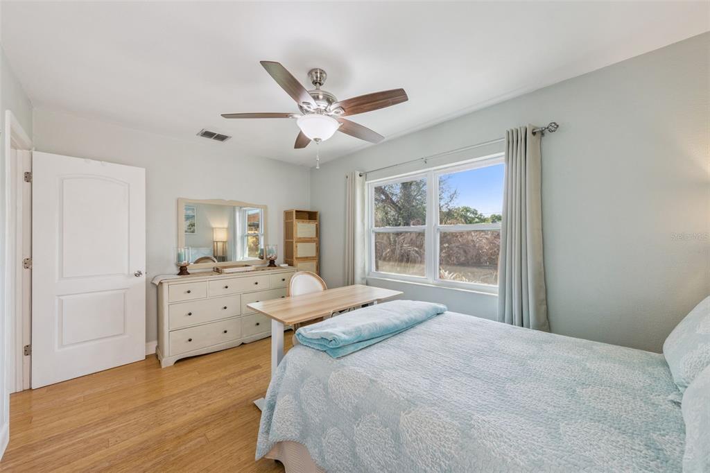 124 East Harding Street Orlando, FL 32806 - Photo 15 of 21 a bedroom with a bed and a large window