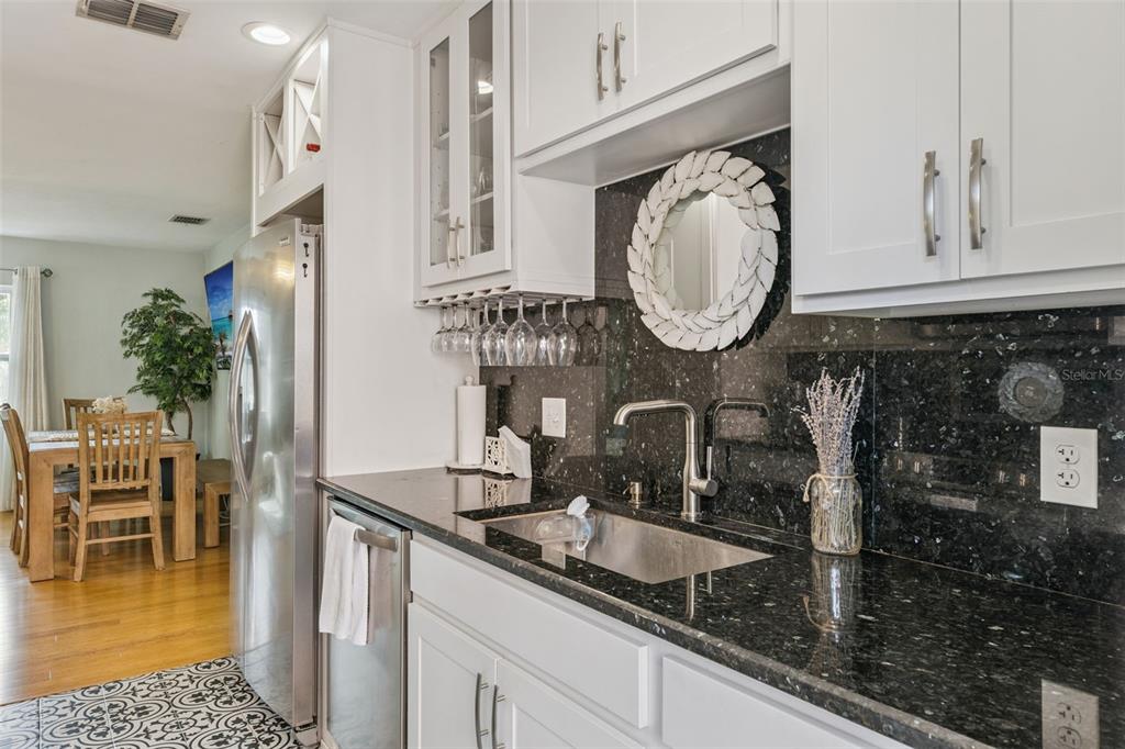 124 East Harding Street Orlando, FL 32806 - Photo 10 of 21 a bathroom with a sink and a mirror