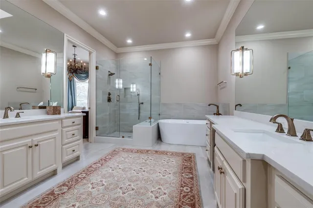 a spacious bathroom with a bathtub shower sink and mirror