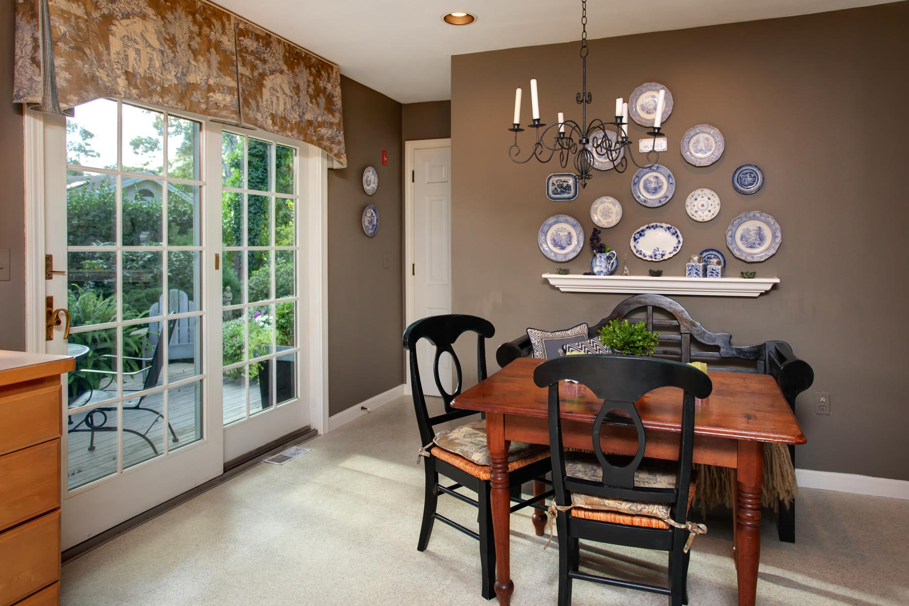 120 Fuller Road Centerville, MA 02632 - Photo 15 of 35 a view of a dining room with furniture a chandelier and window