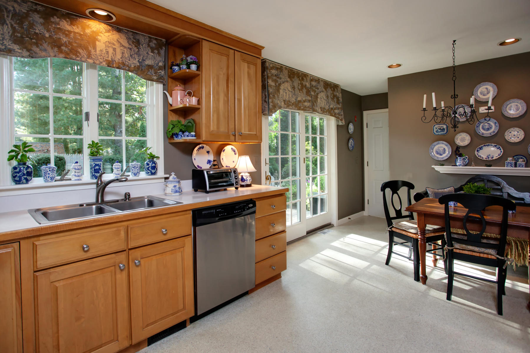 120 Fuller Road Centerville, MA 02632 - Photo 16 of 35 a dining room with furniture a flat screen tv and a large window