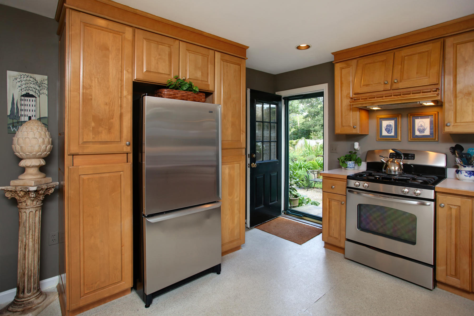 120 Fuller Road Centerville, MA 02632 - Photo 18 of 35 a kitchen with a refrigerator and a stove