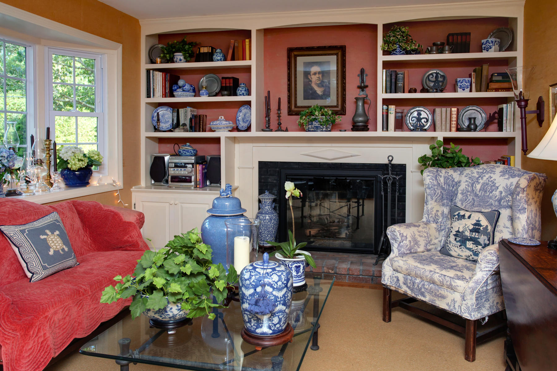 120 Fuller Road Centerville, MA 02632 - Photo 19 of 35 a living room with furniture and a fireplace