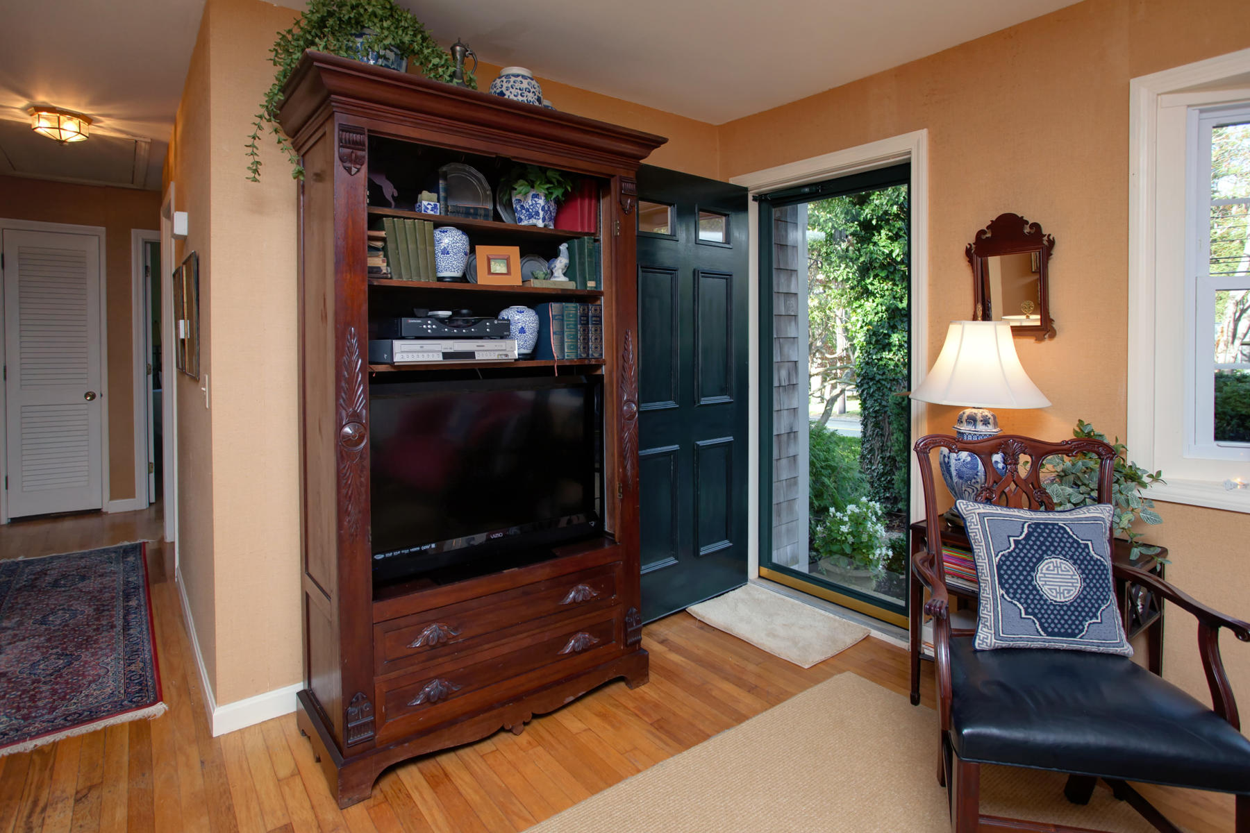 120 Fuller Road Centerville, MA 02632 - Photo 21 of 35 a living room with furniture and a flat screen tv