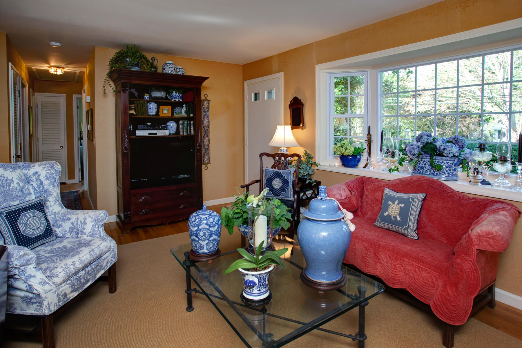 120 Fuller Road Centerville, MA 02632 - Photo 23 of 35 a living room with furniture fireplace and a large window