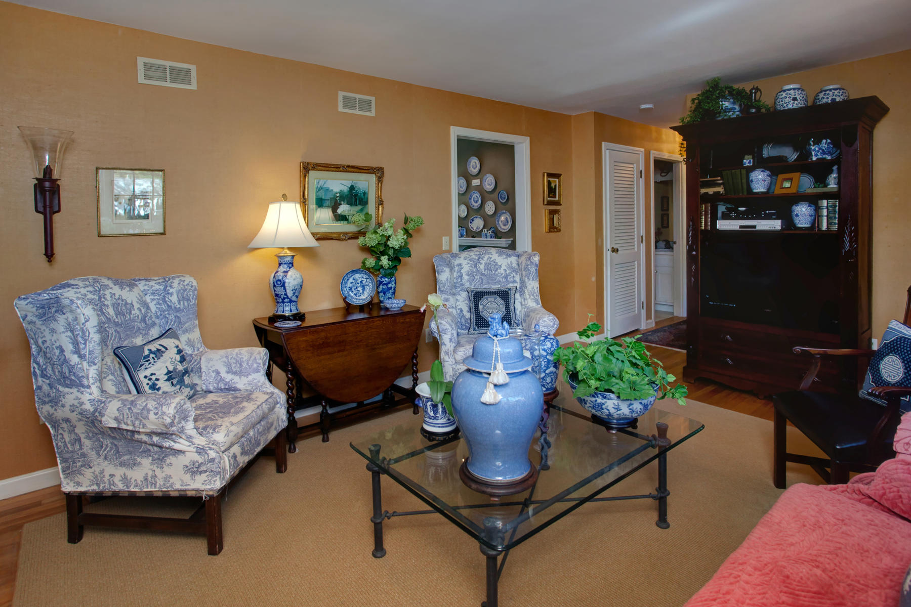 120 Fuller Road Centerville, MA 02632 - Photo 24 of 35 a living room with furniture flowerpot and a flat screen tv