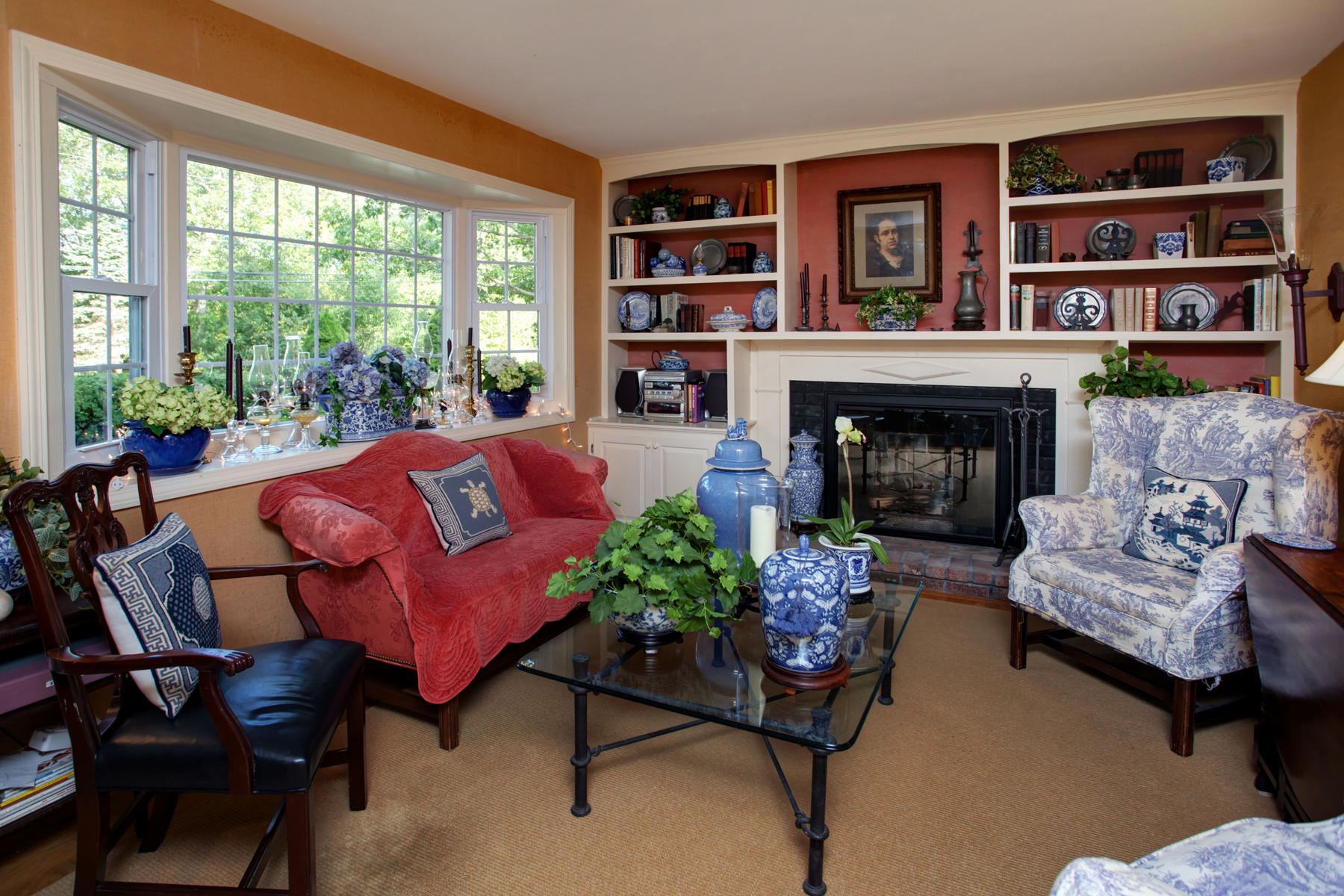 120 Fuller Road Centerville, MA 02632 - Photo 25 of 35 a living room with furniture and a fireplace