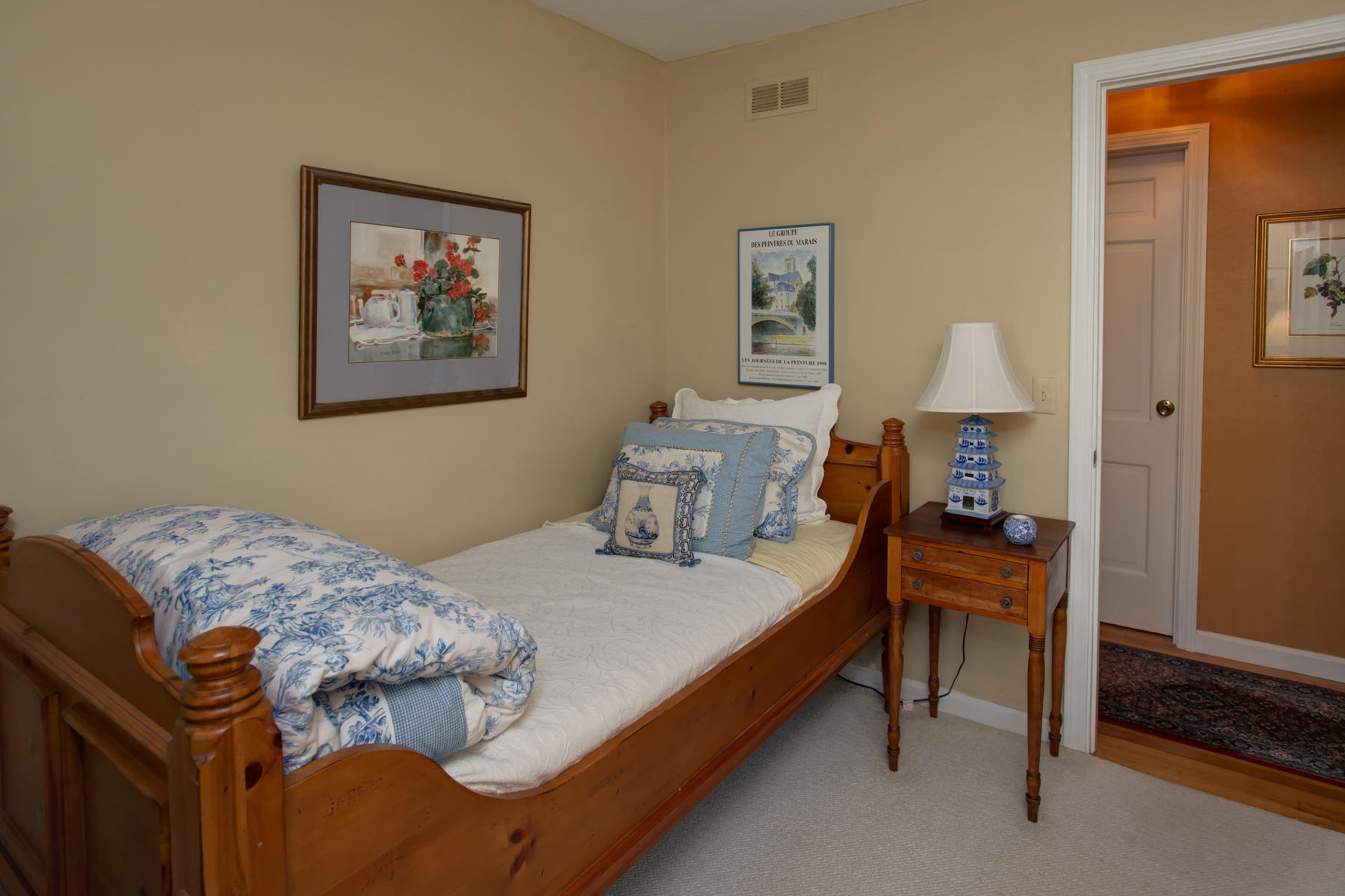 120 Fuller Road Centerville, MA 02632 - Photo 26 of 35 a bedroom with a bed and a lamp on dresser