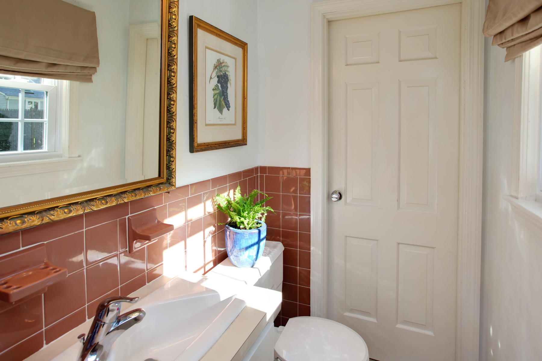 120 Fuller Road Centerville, MA 02632 - Photo 29 of 35 a bathroom with a sink and a mirror