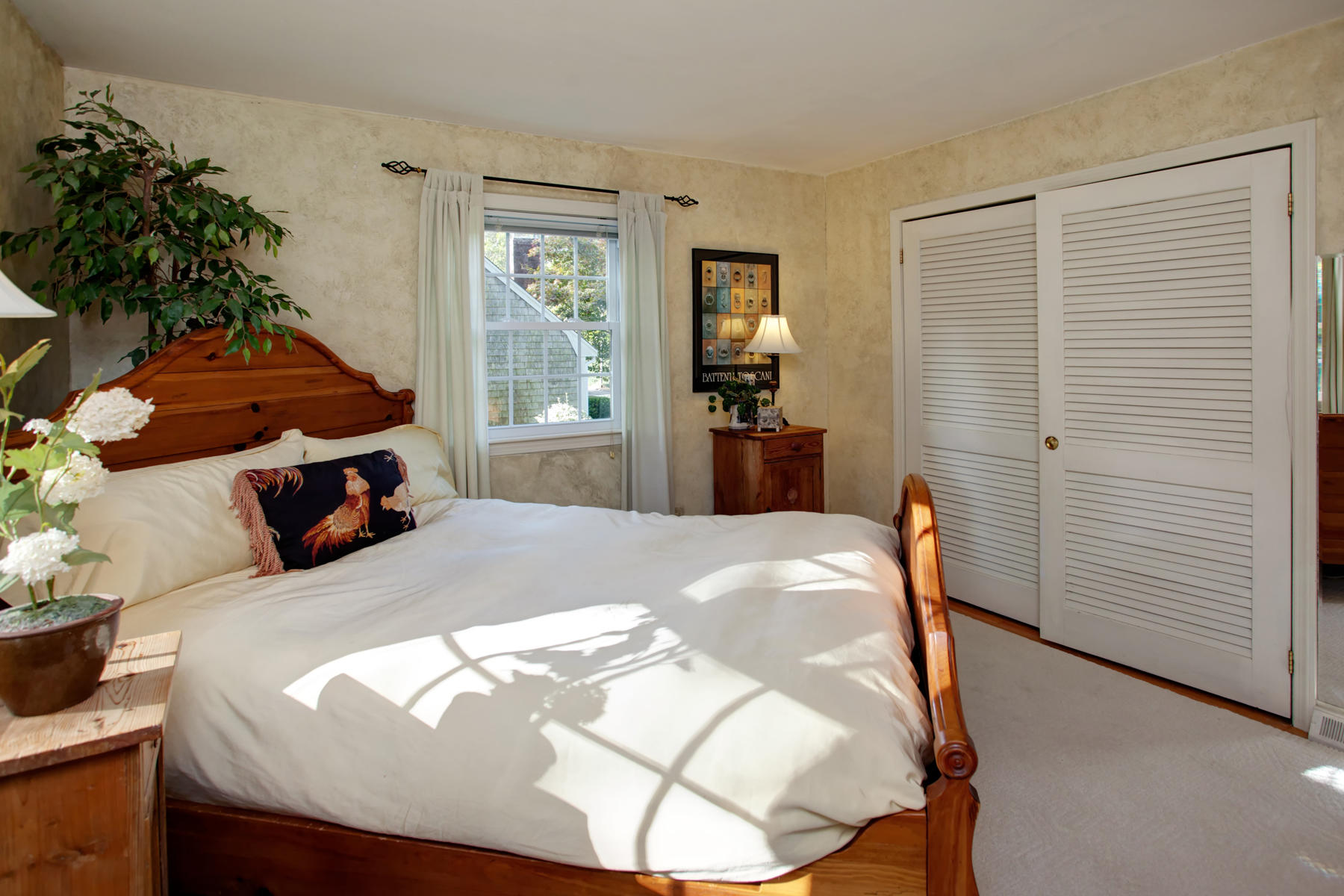 120 Fuller Road Centerville, MA 02632 - Photo 31 of 35 a bedroom with a bed and a window