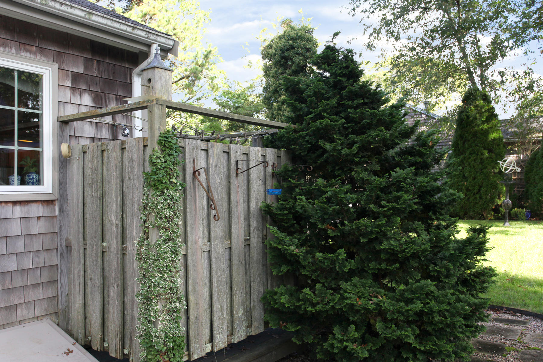 120 Fuller Road Centerville, MA 02632 - Photo 6 of 35 a view of a house with a tree beside it