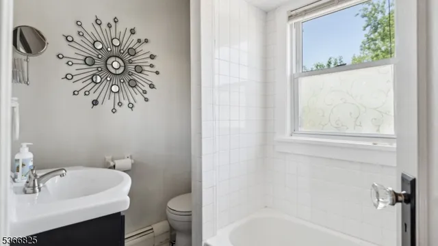 a bedroom with furniture and a bed