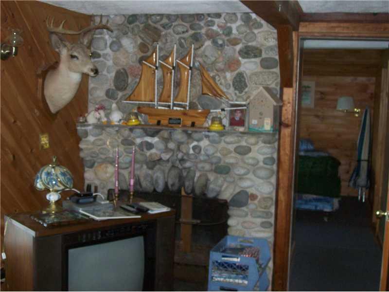 21 Baptism Beach Road Jefferson, ME 04348 - Photo 11 of 13 Living Room. Fireplace with local stones