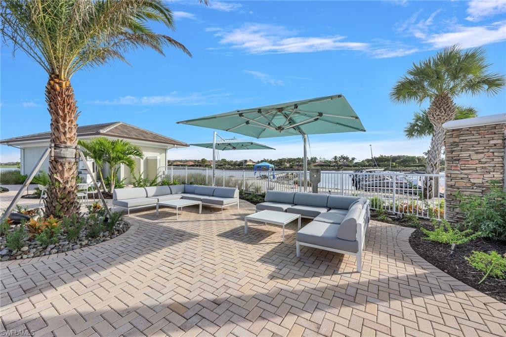 9532 Ironstone Terrace, Unit 102 Naples, FL 34120 - Photo 41 of 45 View of patio featuring an outdoor hangout area